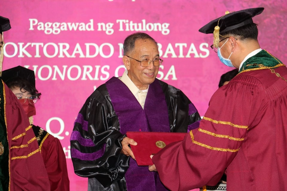 Dr. Emil Q. Javier, National Scientist and former SEARCA Director, receives his honorary degree from UP President Danilo L. Concepcion.